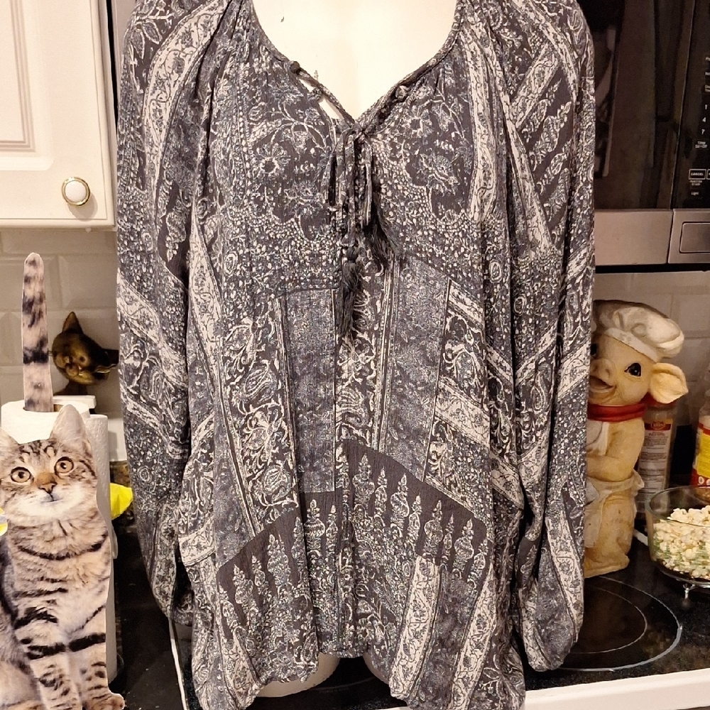 a Wonderly Stretch Long Sleeve Plus Size Top 4X